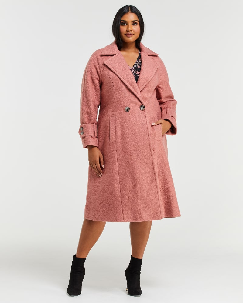 Front of a model wearing a size 1X Porto Coat in Musk Pink by Estelle. | dia_product_style_image_id:235002